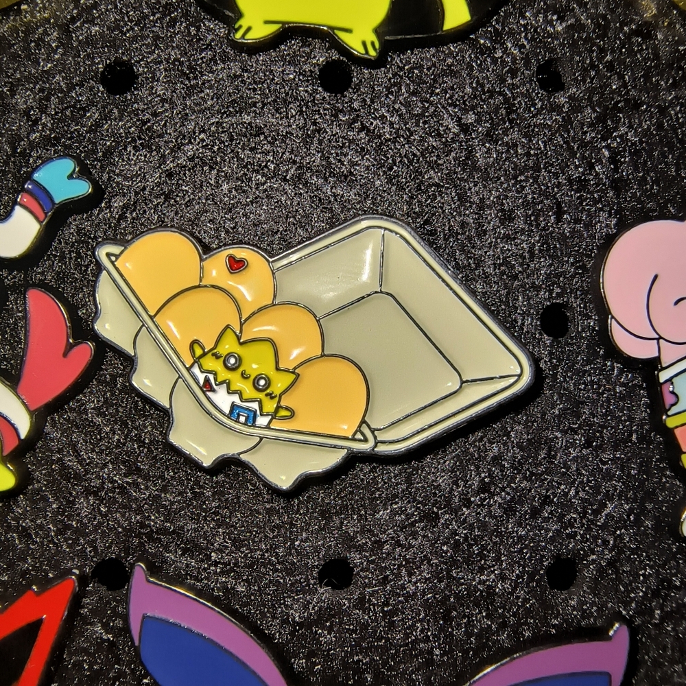 Pokemon Yellow & Cream Egg Carton Enamel Pin